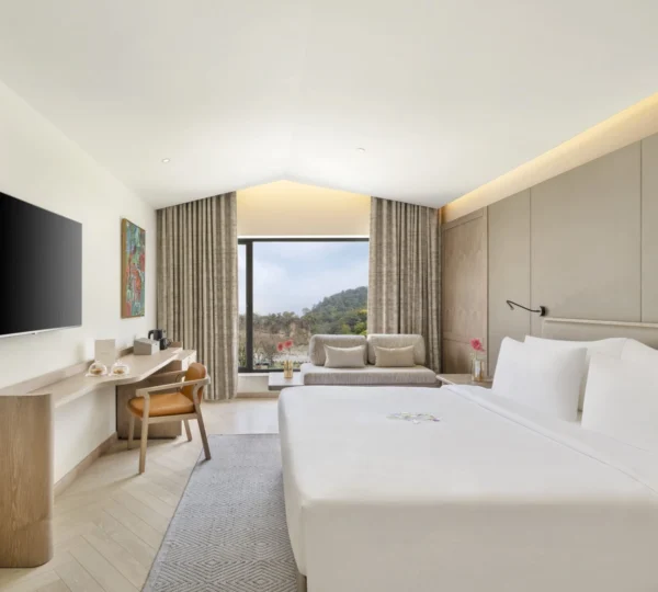 Comfortable resort room included in a Jim Corbett 2 Days 1 Night stay